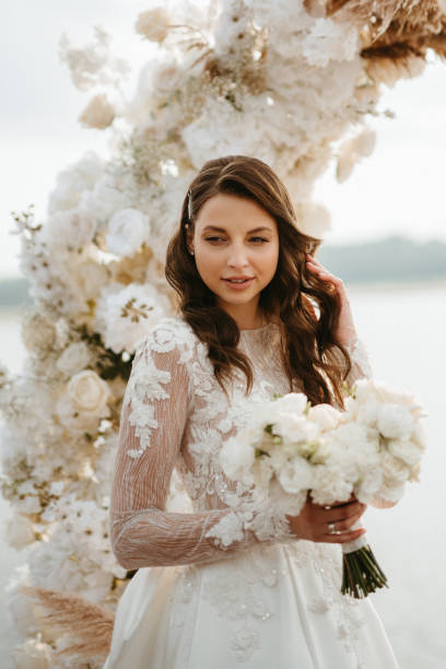 istock bride against the background of a yellow sunset 1925529493