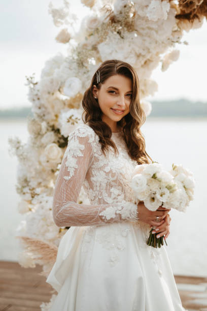 istock bride against the background of a yellow sunset 1925529494