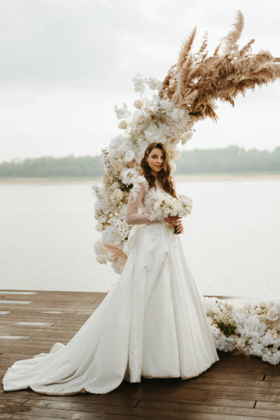 istock bride against the background of a yellow sunset 1925530012