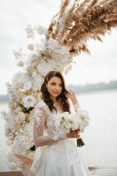 istock bride against the background of a yellow sunset 1925531111
