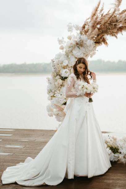 istock bride against the background of a yellow sunset 1925531636