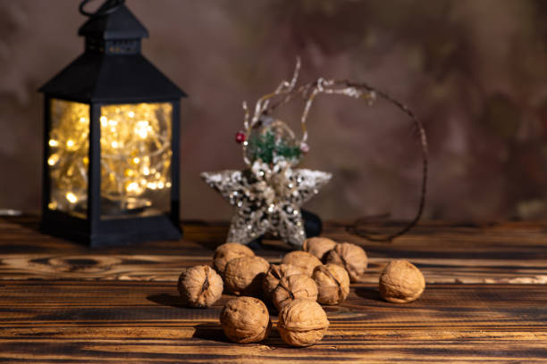 Christmas scene with walnuts, beautiful christmas scene with walnuts on rustic wood, selective focus.