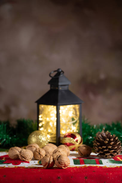 istock Christmas scene with walnuts, beautiful christmas scene with walnuts on rustic wood, selective focus. 1925532185