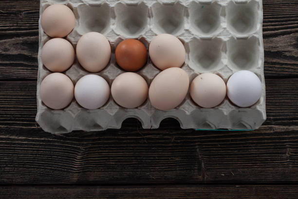 istock Celebrate Easter with Farm-Fresh  Eggs on a Rustic Wooden Backdrop - Traditional Goodness for Your Holiday Feast 1925539596