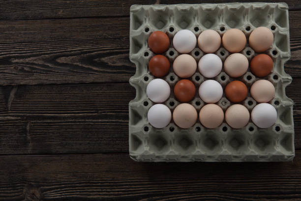 istock Celebrate Easter with Farm-Fresh  Eggs on a Rustic Wooden Backdrop - Traditional Goodness for Your Holiday Feast 1925539877