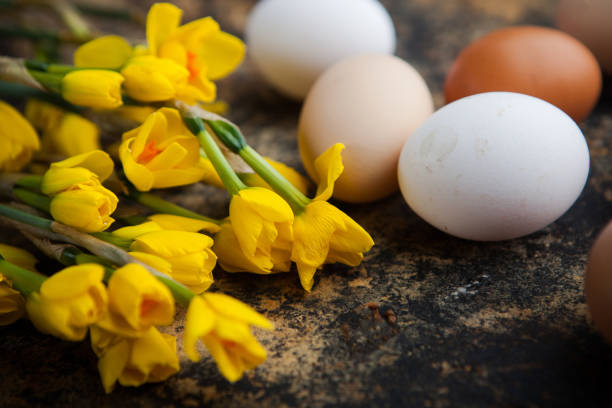 fresh farm eggs on wooden background. Easter tradition