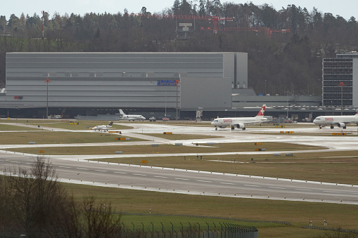 Zurich, Switzerland, January 4, 2024 Different aircraft are taxiing at the international airport