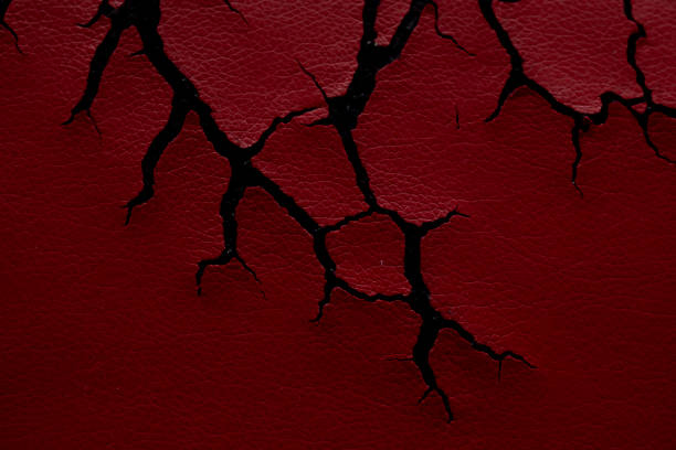 istock red cracked leather of the armchair 1925561829