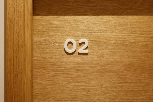 istock Hotel room number on a wooden door 1925571897