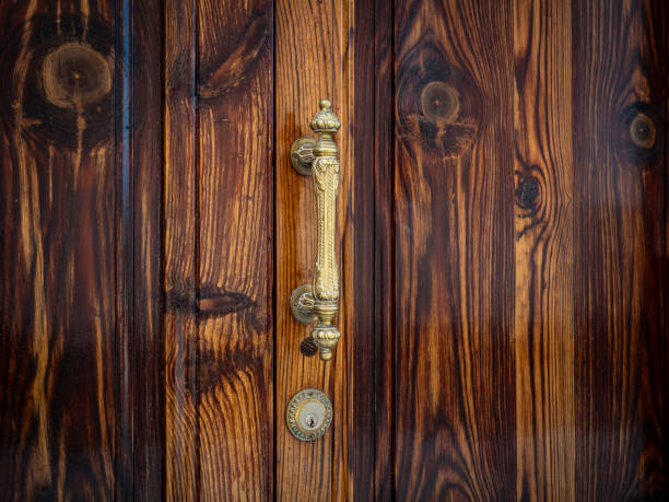 istock vintage woooden door and door handle 1925600503