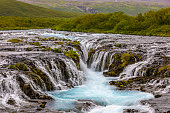 The blue water of the Bruarfoss waterfall in the Golden Circle on Iceland.