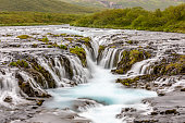 The blue water of the Bruarfoss waterfall in the Golden Circle.