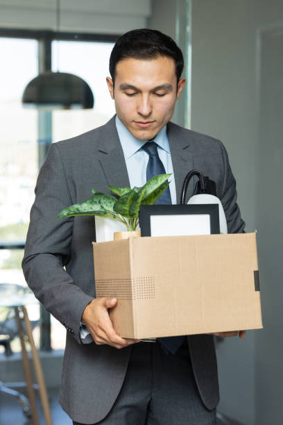 istock Businessman looking sad after getting fired from his job 1925639757