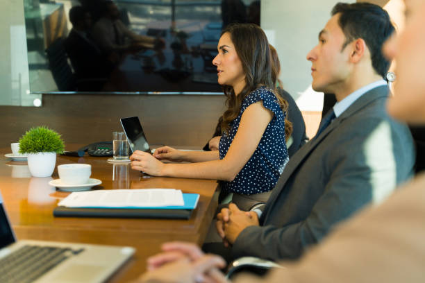istock Group of businesspeople attending a meeting 1925664019