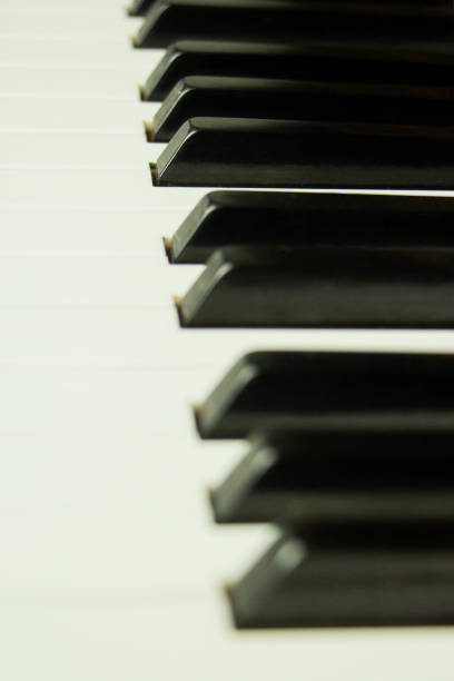 istock Piano keyboard background with selective focus. Warm color toned image 1925675205
