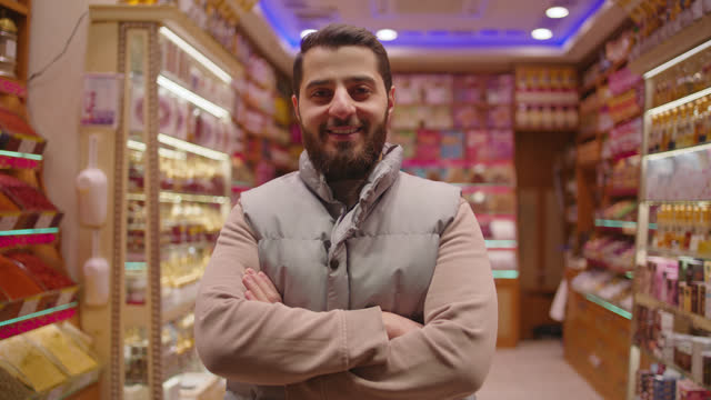 SLO MO Market Maestro: Confident and Kind, Turkish Vendor Poses with Spice-Filled Smiles #SpiceStoreConfidence #MarketKindness #SmilesOfFlavor