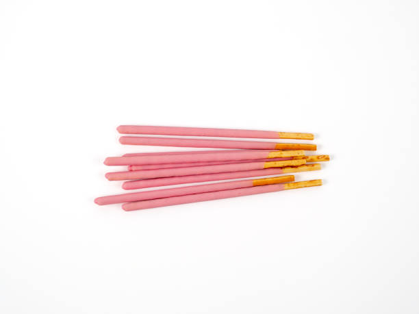 Crispy sticks in pink sugar glaze.