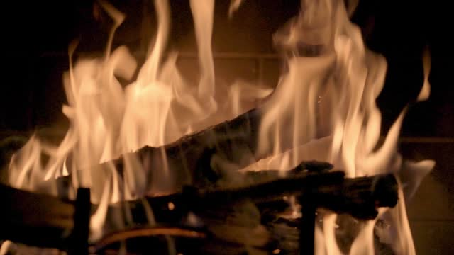 Extreme Close up slow motion blazing fire in fireplace Ellijay Georgia 4k