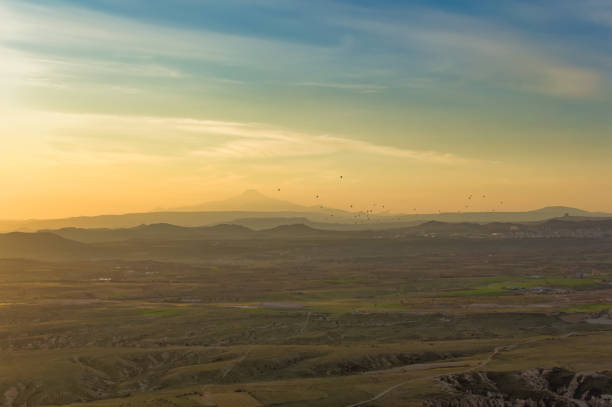 Aerial view over Cappadocia landscape during day.