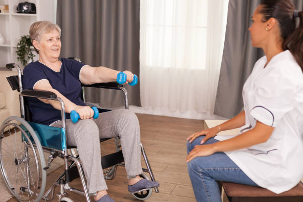 istock Doctor helping the woman with disabilities 1925847010