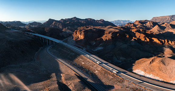 Aerial view of a road near colorful rock textures, near Vermilion Cliffs National Monument, Marble Canyon, Arizona, United States.