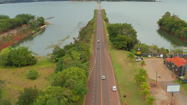 Aerial View of highway adjacent to a large body of water