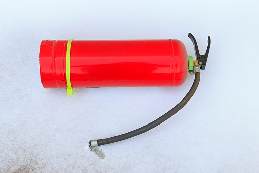 Fire extinguisher in the snow
