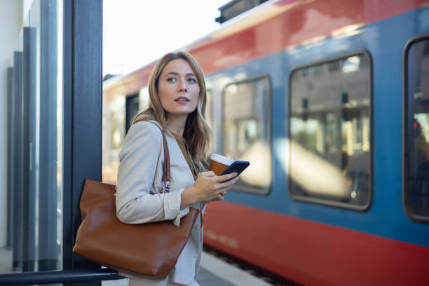 istock A woman using public transport to go to work 1925975069