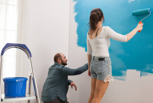 istock Man painting sitting down 1925976235
