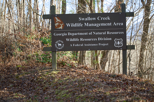 Hiawassee, Georgia - December 28, 2023: Sign near entrance to Swallow Creek Wildlife Management Area just outside of Hiawassee, Georgia.