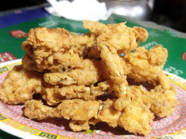 Fried frog meat stock photo