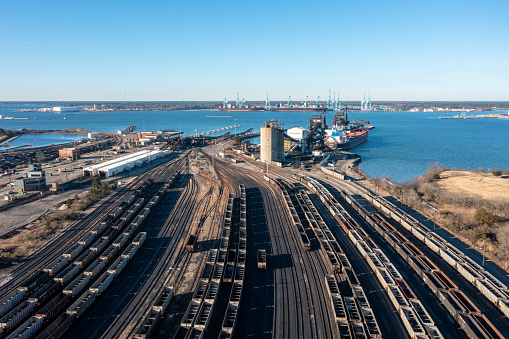 Norfolk Virginia - January 5 2024: Aerial View of a Large Rail Yard Leading out to a Coal Pier in Norfolk Virginia