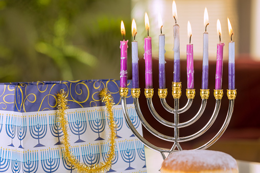 Festival Hanukkah of lights religious holiday symbol Hanukkiah Menorah lit candles