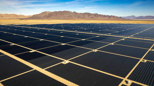 istock Panoramic view of huge solar power plant and mountains 1926228459