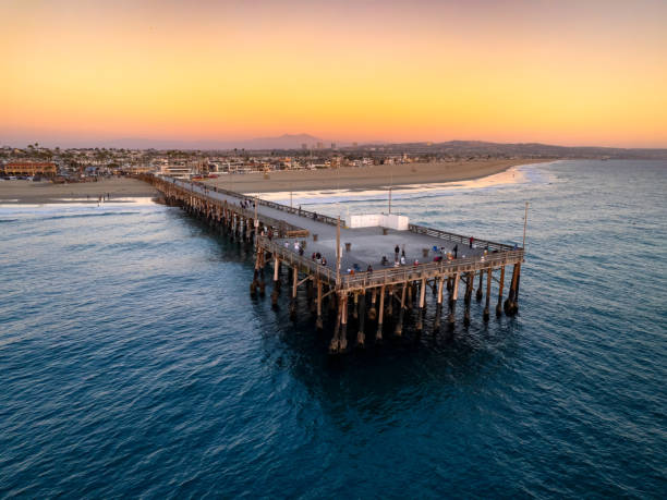 istock Newport beach pier and beaches at sunset 1926251081