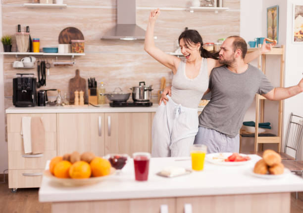 istock Excited happy couple dancing 1926363478