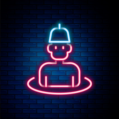 Glowing neon line Man in the sauna icon isolated on brick wall background. Colorful outline concept. Vector.