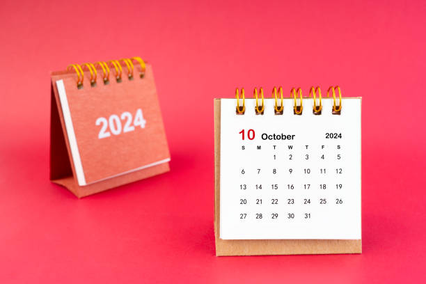 istock 2024 October Mini Calendar On Red Background 1926432986