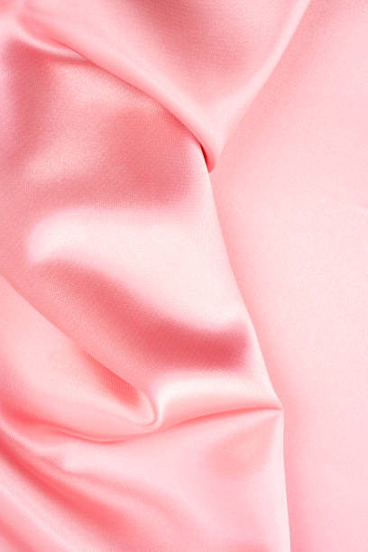 istock Abstract background of luxury cloth pink color silk. 1926433049