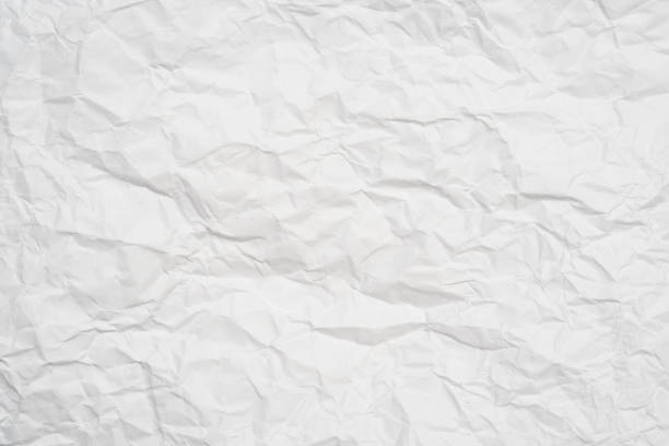 istock clean crumpled of white paper for abstract background and texture. 1926433388
