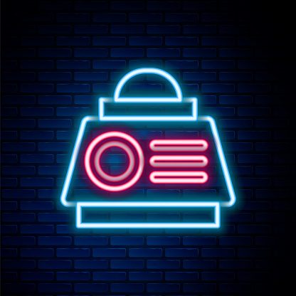 Glowing neon line Space capsule icon isolated on brick wall background. Colorful outline concept. Vector.