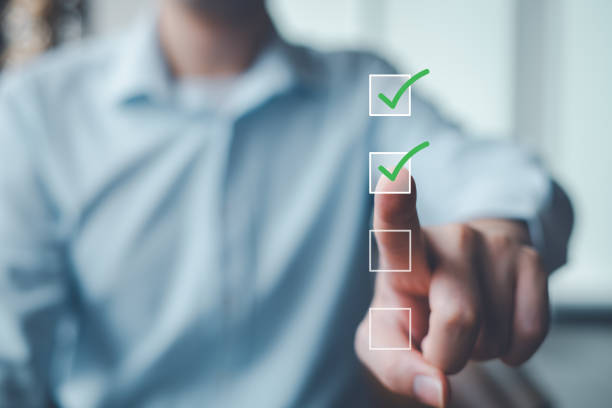 istock Businessman tick correct checkmark on a checkbox for checklist or approve request action. 1926465765
