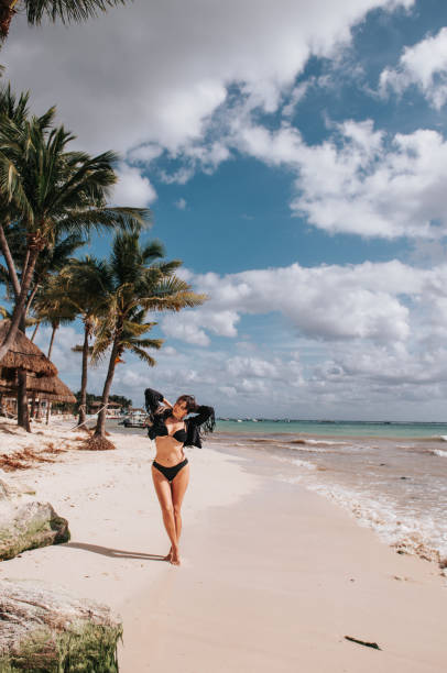 istock Woman in the beach 1926467846