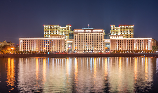 Night view of the Ministry of Defence of Russian Federation, and Moscow river embakment. Translation of the inscription on the facade - Ministry of Defense of the Russian Federation