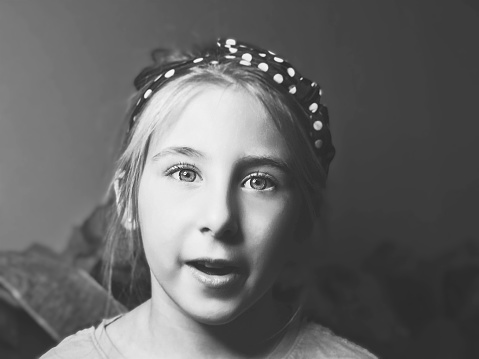 Black And White Portrait Of Little Girl Learning Alphabet