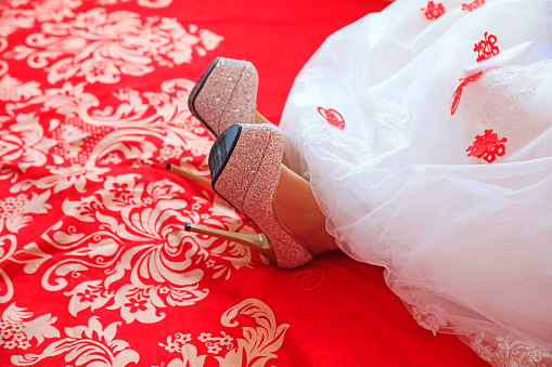 High heels wedding shoes decorated with pearls