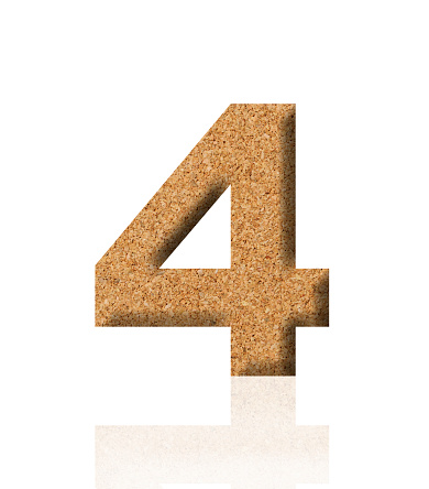 Close-up of three-dimensional cork number 4 on white background.