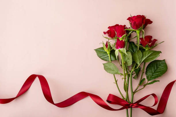 istock Image of a gift with roses and ribbons 1926694108