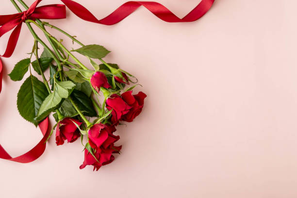 istock Image of a gift with roses and ribbons 1926694115