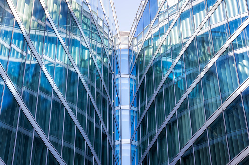 Blue glass modern  office building in Milan, Italy
